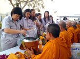 Offering food to the monks