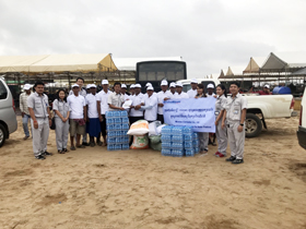 image : The row boat team and our company staff with donated goods