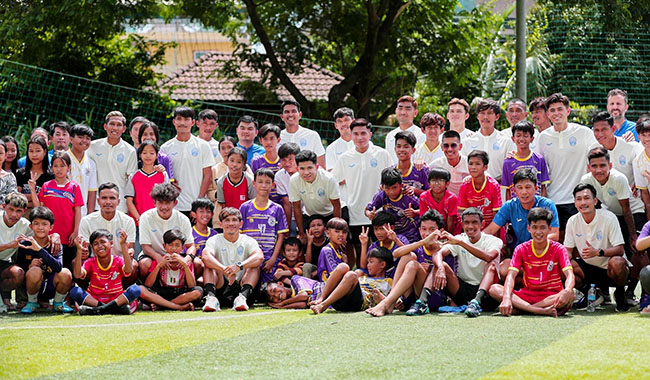 image : Cambodian national soccer team visit an orphanage in Phnom Penh and donate canned food
