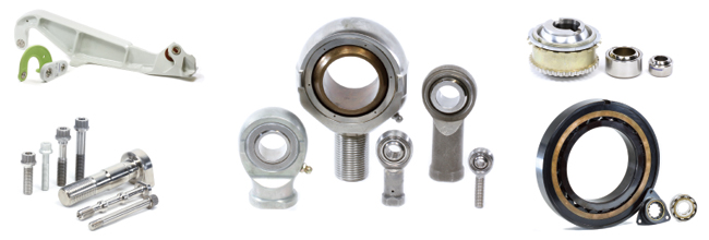 image : Aerospace Products on display (Center: Rod-end bearings, Upper right: Spherical bearings, Lower right: Roller bearings, Upper left: Custom engineered precision mechanical subassemblies for aircraft, Lower left: Fasteners)